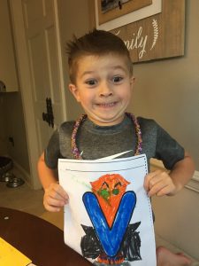 Boy Holding Coloring Page